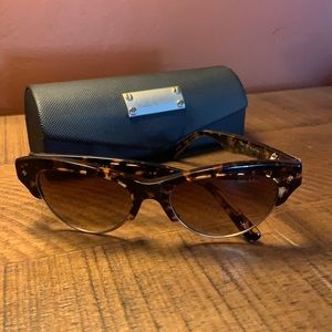 Nicole Miller tortoise shell sun glasses